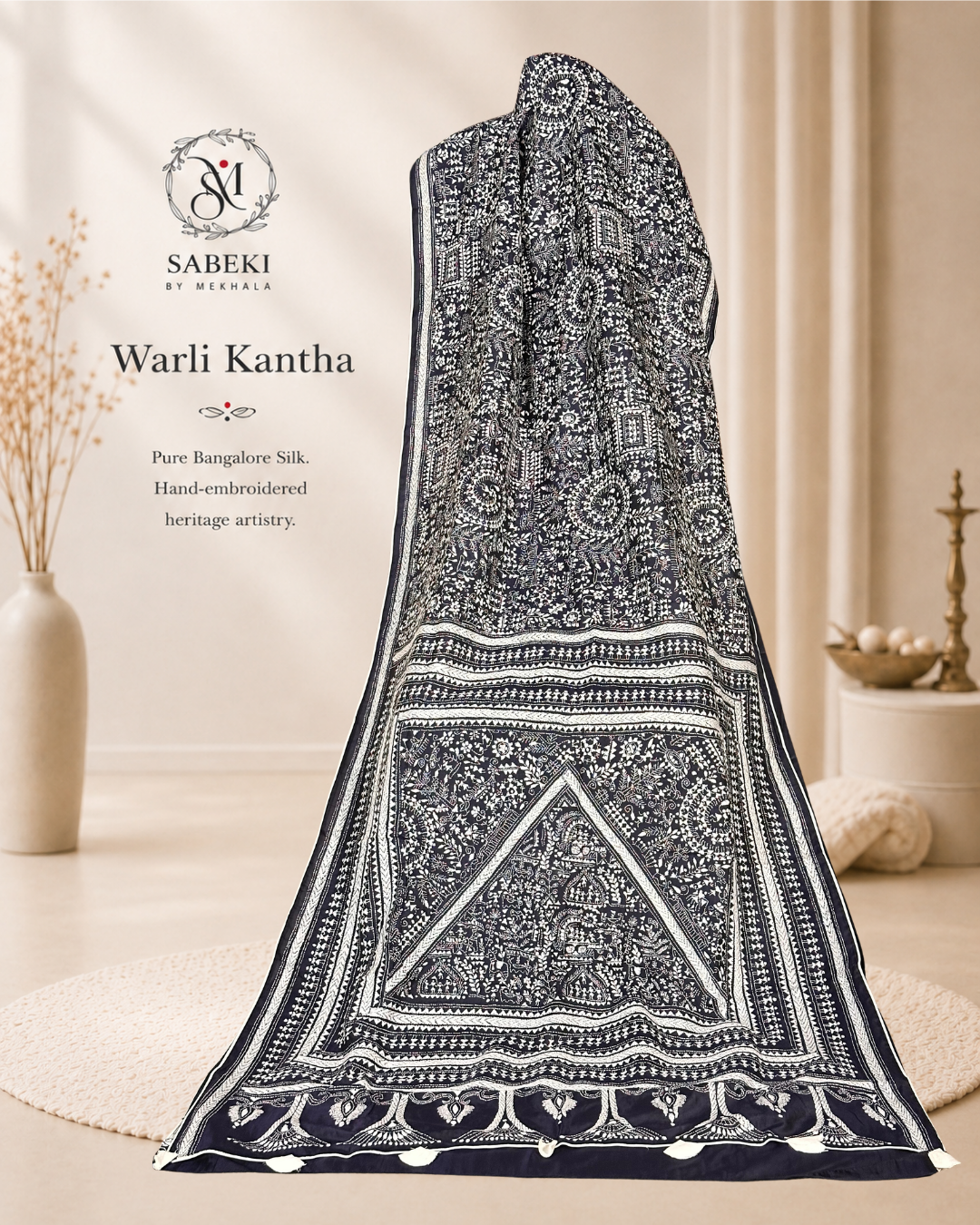 Hand embroidered Warli Kantha motifs on navy blue Bangalore silk saree with Sabeki By Mekhala logo