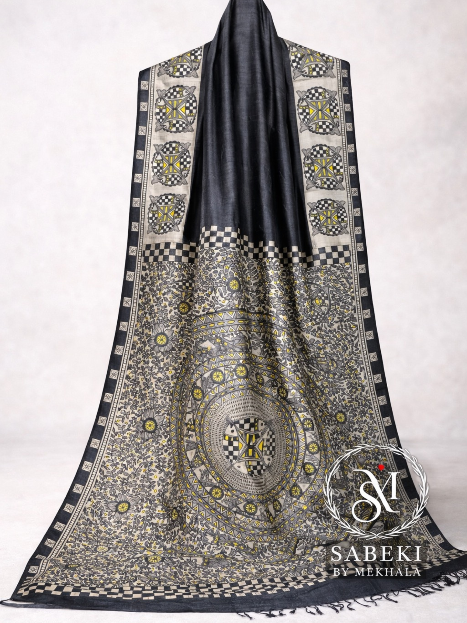 Hand-painted Madhubani silk saree black ivory hero image